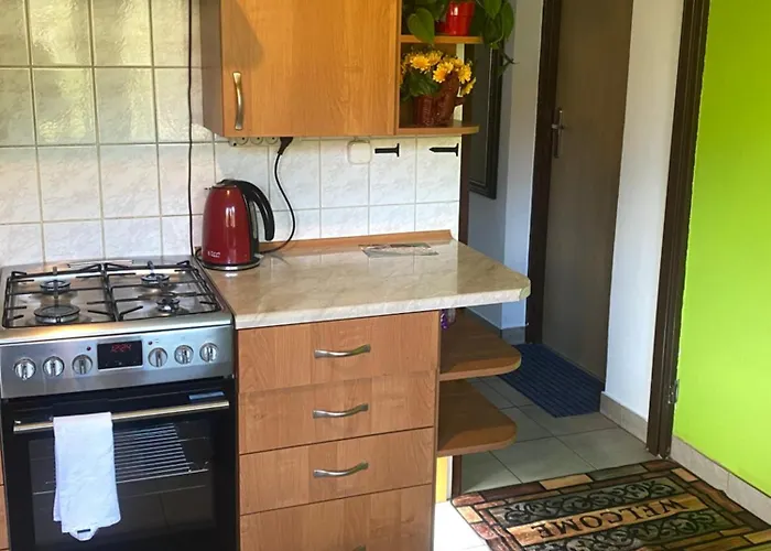 בית אירוח Pokoje Goscinne Pod Lasem