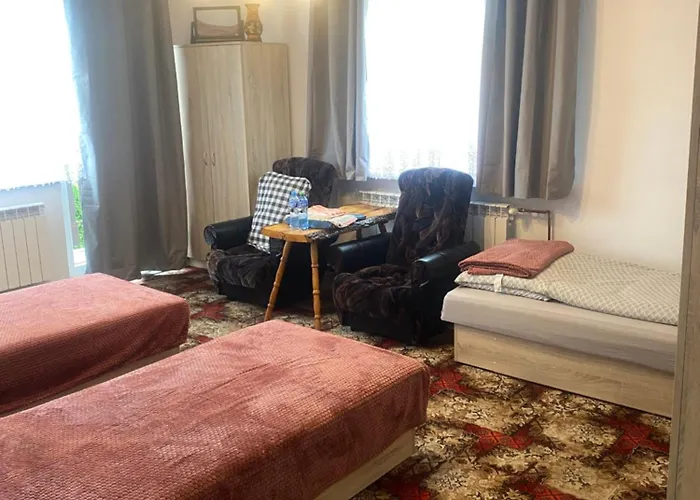 בית אירוח Pokoje Goscinne Pod Lasem