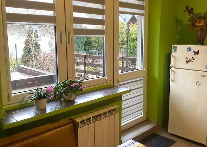 בית אירוח Pokoje Goscinne Pod Lasem