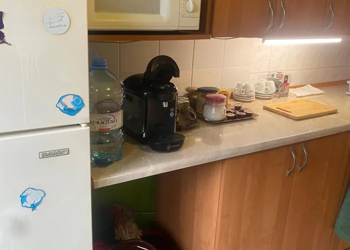 בית אירוח Pokoje Goscinne Pod Lasem